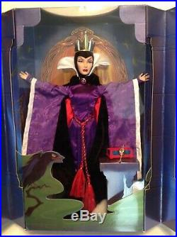Barbie as Snow Wnite and the Evil Queen from Snow White and the seven dwarfs